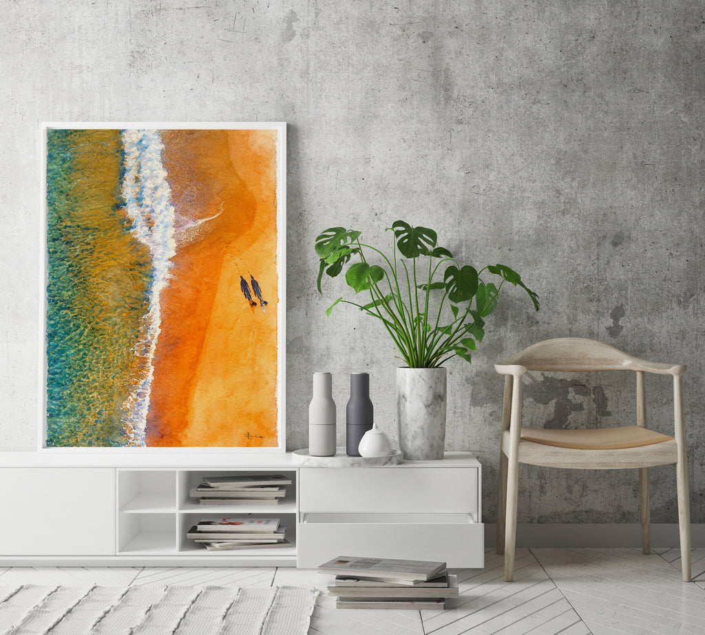 Modern interior with a colorful abstract painting, plant, and chair against a gray wall.