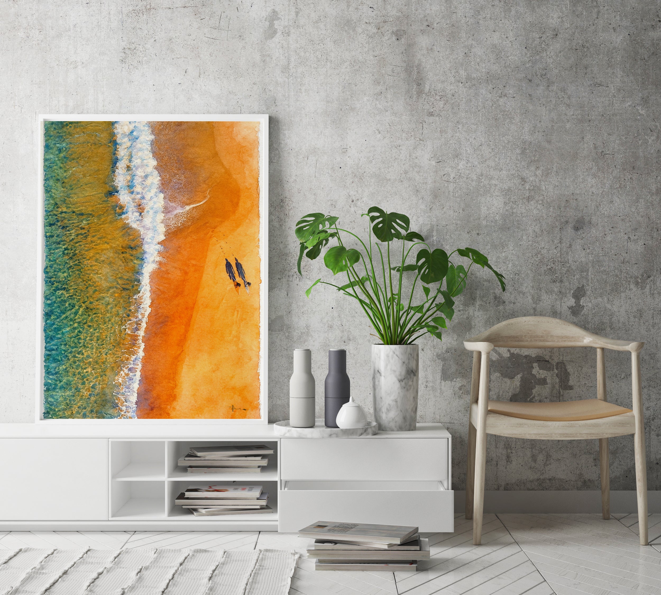 Modern interior with a colorful abstract painting, plant, and chair against a gray wall.